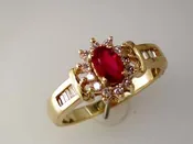 Oval Cut Ruby and Diamond Ring
