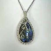 Carved Labradorite Wire Wrapped Pendant — Imperial Gems