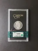 1882 CC $1 Morgan Silver Dollar in GSA Holder CAC MS63 PL