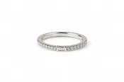 10kt white gold diamond wedding band with a baguette center stone size 6 3/4