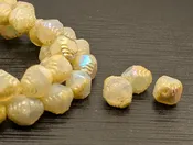 8x9.5mm Ivory AB Faceted Bicone 15 beads on a strand
