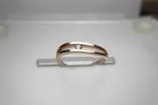 14 Karat Rose Gold Channel Set Ring With One 0.05Ct Round Diamond
