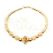 All Gold Twist Bangle with Stardust Ball