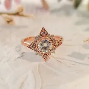 14k Rose Gold Moissanite and Diamond Art Deco Halo ring