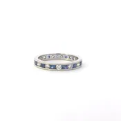 18 Karat White Gold channel set Sapphire & Diamond eternity band.