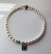 "Chai" pendent in a Pearl Necklace — Your Site Title