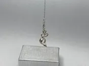 Snake Charm — David I. Helfer Jewelers