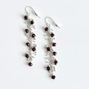 Delicate Feather Earrings: Garnet