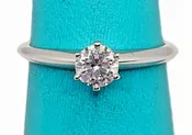 Tiffany & Co. 0.33 Carat Solitaire Diamond Plat Ring —   DeWitt's Diamond & Gold Exchange