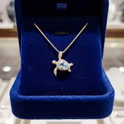 Aquamarine Sea Turtle Pendant Necklace in Yellow Gold