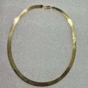 14kt 18", 6.7mm Wide Herringbone Necklace Weighing 12.3dwt..