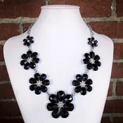 Black flowers with tiny pearls necklace