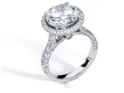 CATHEDRAL ROUND HALO DIAMOND ENGAGEMENT RING IN 18 KARAT WHITE GOLD