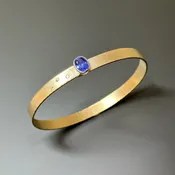 Gold Bracelet with a Blue Sapphire and Diamonds