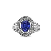 1.86 Carats Oval Blue Sapphire On A Pave Set Diamonds Ring 14 Karat White Gold