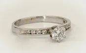 A .41ct Diamond With 1/4ct Channel Set White gold Ring