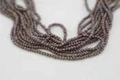 10 strand set of tiny dyed deep brown pearls