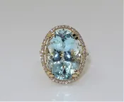 Ladies Halo design Aquamarine and Diamond Ring