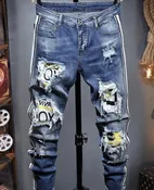Faded ripped and printed jeans