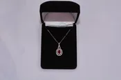 18KT White Gold Ruby Pendant with Diamond Halo