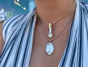 N75 Mother of Pearl Necklace — Lilly Barrack  Seasoned artist, Lilly Barrack, has been designing hand-made sterling silver gemstone jewelry for more than three decades. The Lilly Barrack’s three store locations (two in Albuquerque, NM, and one in Scottsdale, AZ.) carry exclusive gift items and designs from upwards of 60 unique artists.