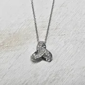 10k White Gold .08ctw Love Knot Diamond Pendant