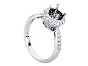 CATHEDRAL ROUND HALO DIAMOND ENGAGEMENT RING IN 14 KARAT WHITE GOLD
