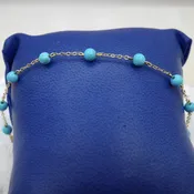 14kt Yellow Gold 7″ Bracelet with 9 4mm Turquoise Beads