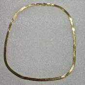 14kt Gold, 18", 4.28mm Wide Herringbone Chain that Weighs 6.8dwt..