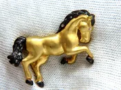18kt Horse Pin .10ct diamonds