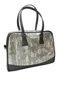 Briefcase in silver trees