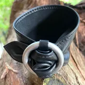 Black leather cuff with silver buckle