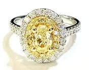 18K White Gold Ring with .93CT GIA Fancy Yellow Oval Diamond, With .83ct side Diamonds
