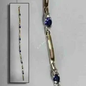 10k yellow gold bracelet with blue sapphires and white sapphire