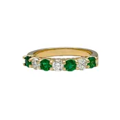 0.56 Carat Round Emerald and 0.47 Round Diamond Shared Prong Band in 14K Yellow Gold