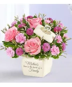 A MOTHER'S LOVE IS THE HEART OF A FAMILY