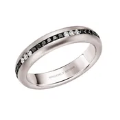 Platinum eternity band with black and white diamonds