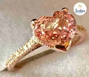 14 karat Rose Gold ring with Padparadscha (Padperajah) Sapphire and 12 diamonds