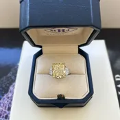 A Fancy Intense Yellow Diamond Ring
