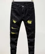 Black rippled ripped jeans