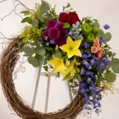 Funeral arrangement on the easel with natural elements