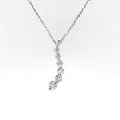 Graduated Diamond Curved Pendant Necklace in White Gold