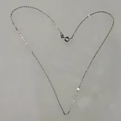 16, 18, and 20-inch slender Italian 925 sterling silver Diamond-Cut cable chain with spring ring clasp. Rhodium Plated.