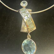 7 Stone Blue Topaz Pendant