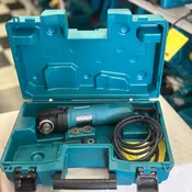 Makita 3 Amp Corded Variable Speed Oscillating Multi-Tool Kit With Blade, Sanding Pad, Sandpaper, Adapter, Hard Case