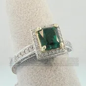 1.30ct Emerald Cut Emerald and Diamond Halo Ring 18K Gold | Warren Jewelers