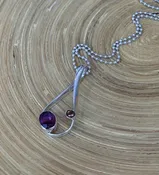 N76 Wine Morganite Necklace — Lilly Barrack  Seasoned artist, Lilly Barrack, has been designing hand-made sterling silver gemstone jewelry for more than three decades. The Lilly Barrack’s three store locations (two in Albuquerque, NM, and one in Scottsdale, AZ.) carry exclusive gift items and designs from upwards of 60 unique artists.