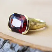Garnet hassanite 10k yellow gold ring