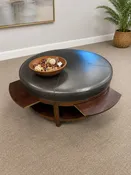 39" ROUND, BROWN LEATHER OTTOMAN, SLIDE-OUT TRAYS ON SIDE