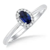 10Kt White Gold 5x3mm Oval Blue Sapphire & 0.07cttw Diamond Halo Ring